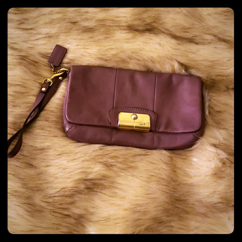 Used Coach wristlet plum